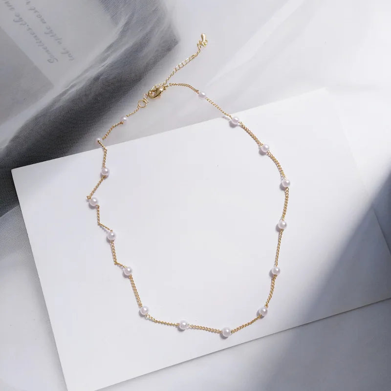 Gouden parel choker ketting 