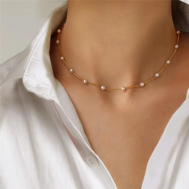 Gold pearl choker necklace